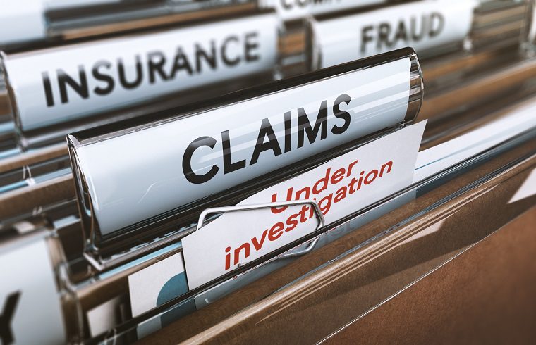 Folder with close up on the word claims and a note where it is written under investigation. Concept of insurance fraud, 3d Illustration